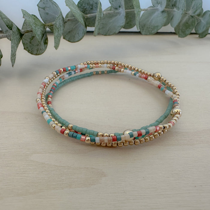 Sedona Stack: earthy, dainty bracelet set in beige, sand, sage, and terracotta—perfect for spring layering and everyday style.