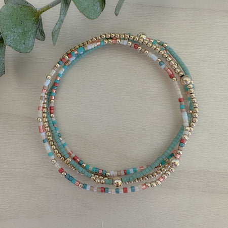 Sedona Stack: earthy, dainty bracelet set in beige, sand, sage, and terracotta—perfect for spring layering and everyday style.