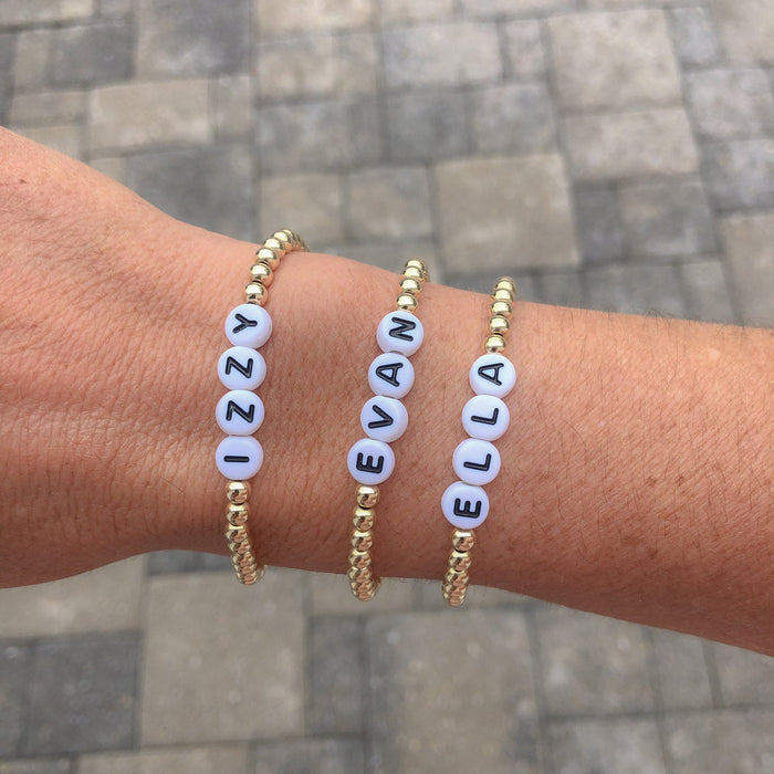 Custom personalized name bracelet with initials, names, or meaningful words. Perfect for stacking bracelets, layering, and gifting.