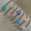 gold beaded bracelets with colorful acrylic stars